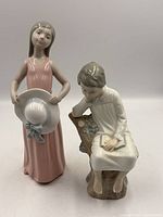 Both Lladro figurines front view