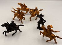 Six cowboy figurines overview