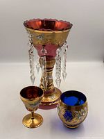 Group view of three Bohemian glass pieces