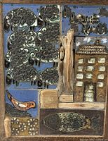 Overall view of framed mixed media artwork showing ceramic and bronze components and subject matter