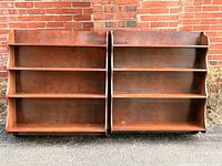 Front view of both wooden plate racks side by side