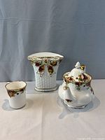 Group shot of teapot, vase and mug