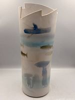 full view showing vase form, decoration and irregular rim