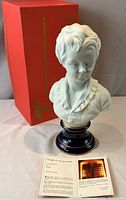 Bust, pedestal, box and certificate full view