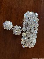 Bracelet and both earrings showing bead clusters and aurora borealis finish