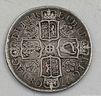 Reverse side showing four crowned shields cross design and date 1708
