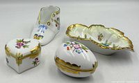 All four Herend Queen Victoria porcelain pieces grouped