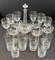 Entire set arranged: decanter with stopper, six wine glasses, six champagne coupes, six tumblers