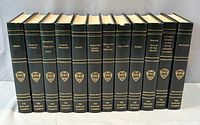Spines of all 12 Harvard Classics volumes in a row