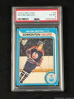 Front of slabbed card displaying PSA label and card front