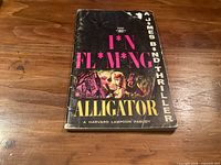 Front cover showing title, author spoof and publication details