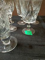 Close-up of cut patterns on glasses and vase