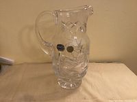 Front view of Bohemia crystal jug with labels visible