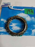 Bracelet showing full circular form and jewel arrangement