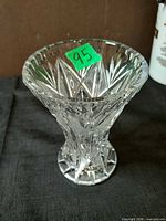 Overall view of clear cut crystal pedestal bowl showing flared rim and decorative cuts
