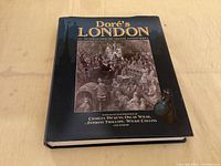 Front cover of Doré's London book with title and engraving