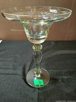 full view of pedestal compote bowl showing etched floral pattern and overall form