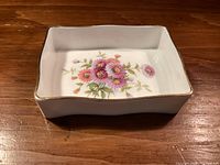Top view of rectangular Hammersley floral trinket dish showing pattern and gilt rim