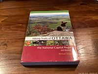 Front cover of hiking guidebook showing title, author and imagery