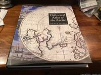 Front cover of the hardcover book showing title and dust jacket