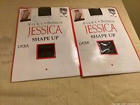 Front view of two identical sealed Silky Jessica Shape Up control panty packages