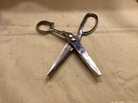 Full view of Lamplough pinking shears open showing serrated blades and handles