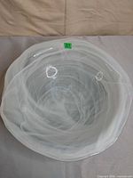 Top view of round alabaster glass bowl showing overall form and condition