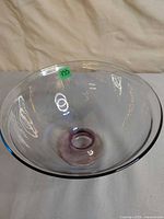 Top view showing clear iridescent bowl interior and overall diameter