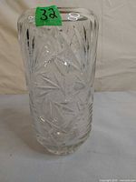 full view of tall cut crystal vase
