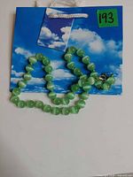 Full view of necklace showing bead strand and clasp