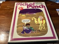 Front view of the hardcover book with dust jacket showing title, editor, and cover illustration