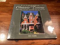 Front cover of Picturesque Ontario Towns softcover book showing title, author, and cover image.