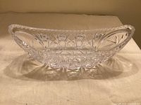 Overall view of clear cut crystal boat-shaped dish