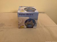Front of boxed Polar Bears 3D puzzle sphere