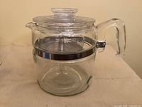 Full view of assembled glass percolator with lid
