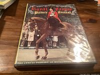 Front cover of Royal Family Picture Annual showing Queen Elizabeth II on horseback with title and dust jacket