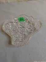 Top view of sawtooth cut glass candy dish