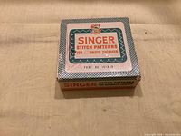 Closed Singer stitch patterns box showing part number