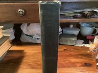 Spine view of hardcover showing title and year