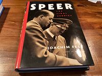 Front of hardcover book showing title, author and cover photo