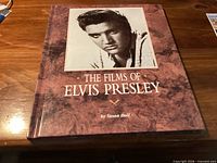 Front cover of "The Films of Elvis Presley" hardcover book