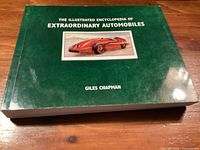 Front cover showing title, author Giles Chapman, red car illustration