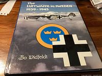 Front cover of hardcover book with title, author, aircraft imagery