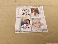 Front of souvenir sheet showing four stamps and Millennium Collection text