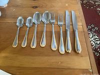 Full view of eight Tradition pattern flatware pieces