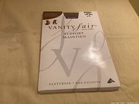 Front of sealed Vanity Fair support pantyhose package