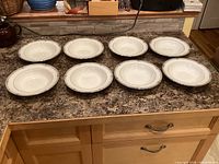 All eight Wedgwood Amherst bowls laid out showing consistent condition and pattern