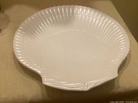 Top view of white Wedgwood shell dish