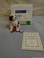 Sheepdog figurine, booklet, shipping box overview