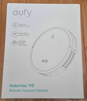 Front of boxed eufy RoboVac 11S showing branding and outline image